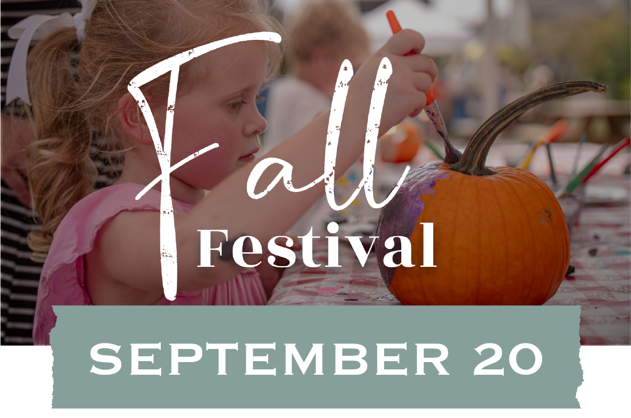 Fall Festival A girl painting a pumpkin
