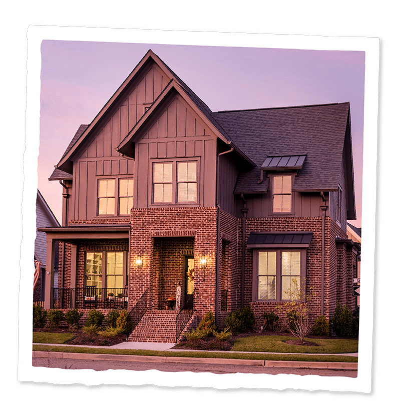 A home by Legend homes, mad of brick and wood.