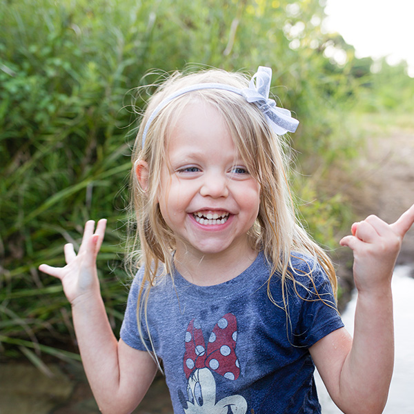 A little girl playing in a creek in stephens valley