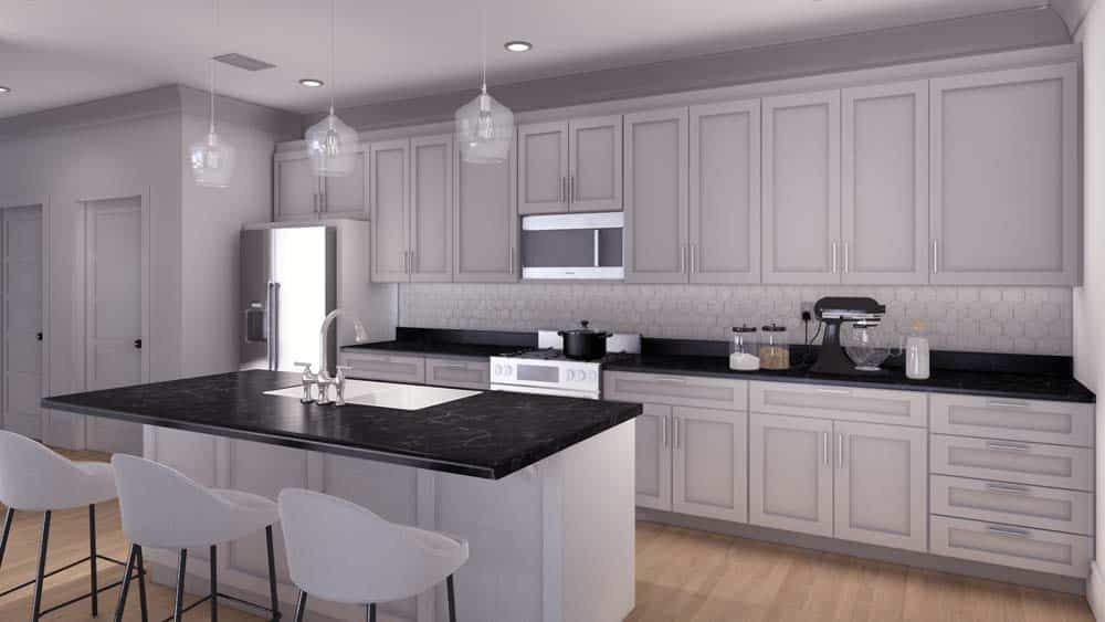 A kitchen with a kitchen island with black countertop