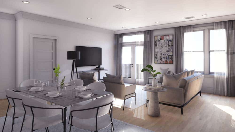 A dining table and living area in a stephens valley west apartment