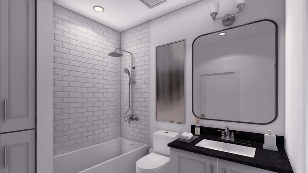 A bathroom with white walls and a white tile shower