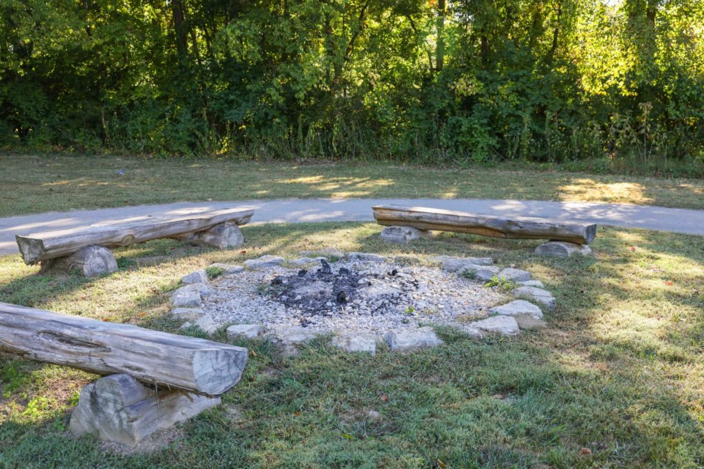 Log benches around a firepit