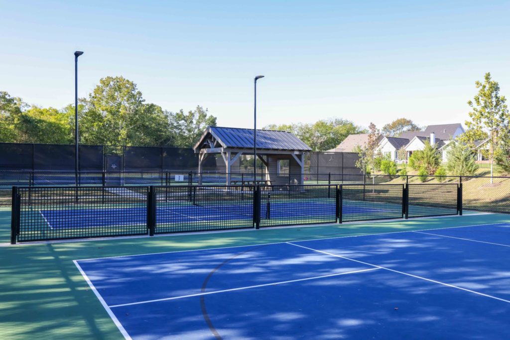 The blue and green tennis courts in stephens valley