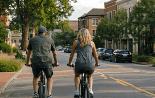 Two people riding bikes in downtown Stephens Valley