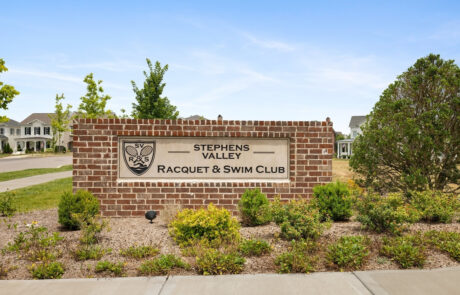 A sign for the stephens valley racquet and swim club